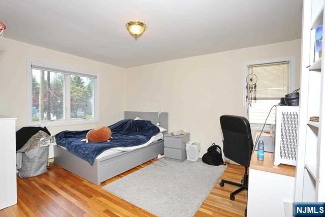 84 12th Street Cresskill, NJ 07626 - Photo 31 of 45 a living room with furniture and a window