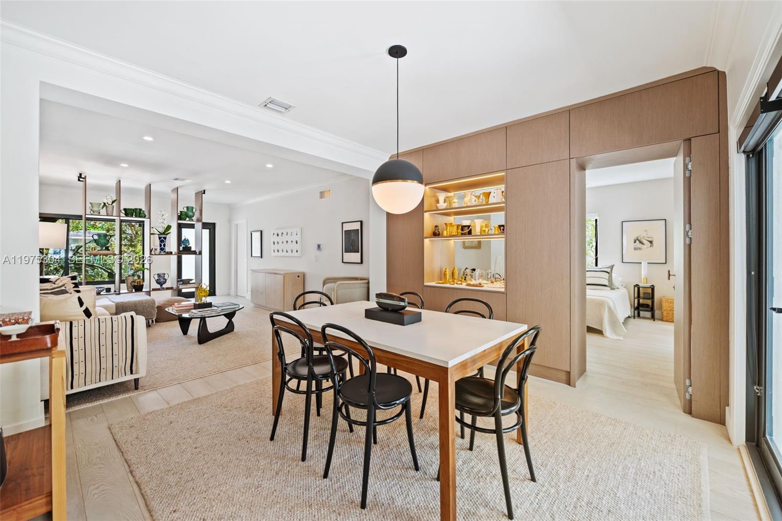 740 Northeast 76th Street Miami, FL 33138 - Photo 11 of 43 a view of a dining area with furniture and window