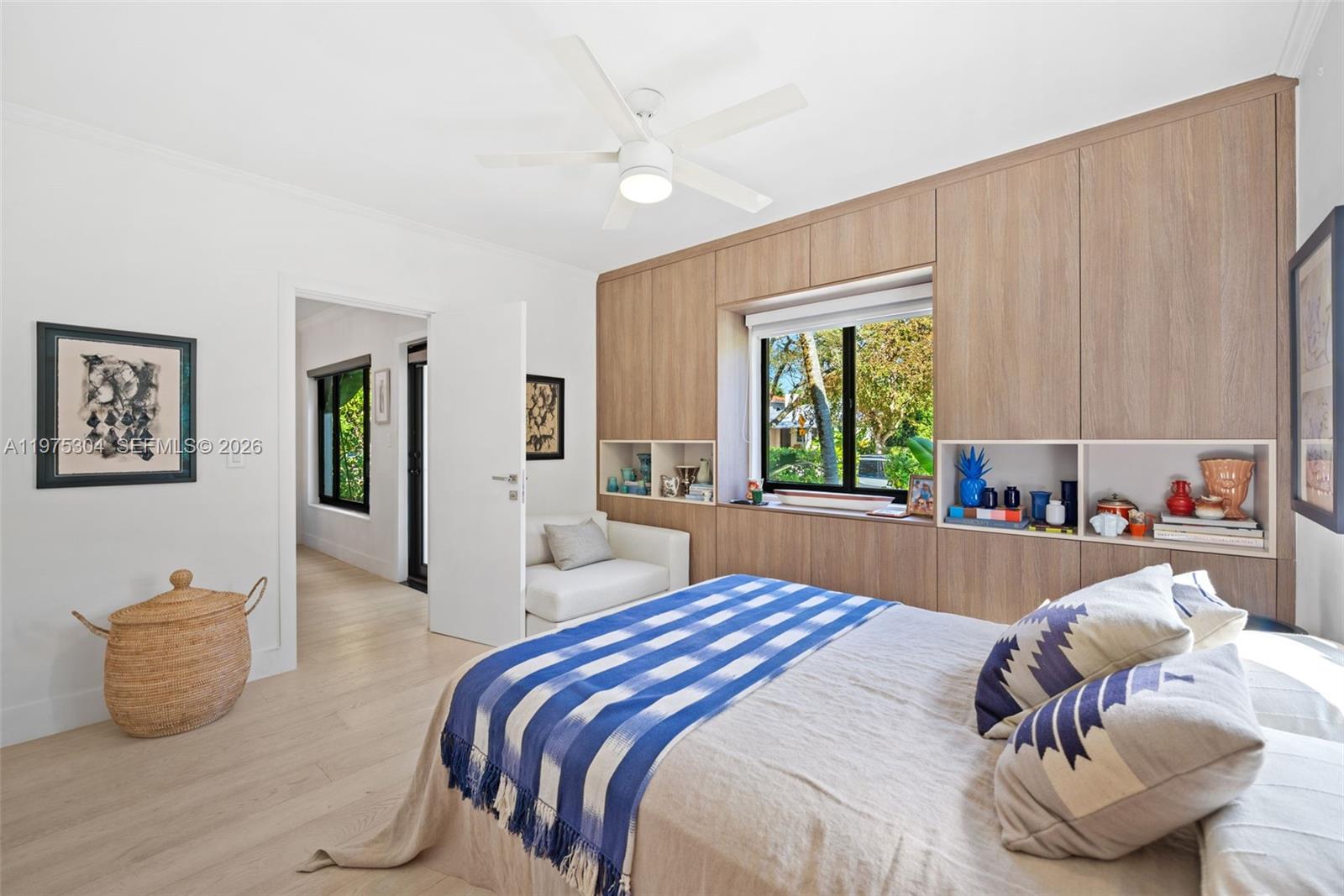 740 Northeast 76th Street Miami, FL 33138 - Photo 20 of 43 a bedroom with a bed and window