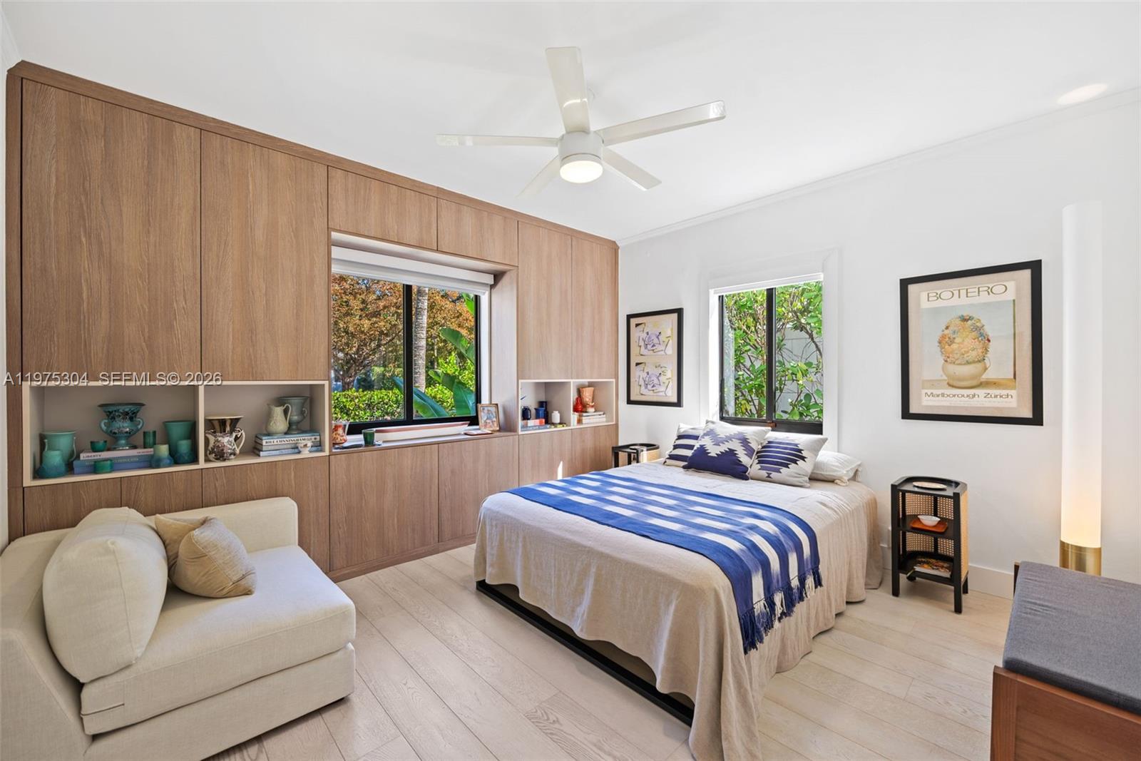 740 Northeast 76th Street Miami, FL 33138 - Photo 21 of 43 a bedroom with a bed and a couch