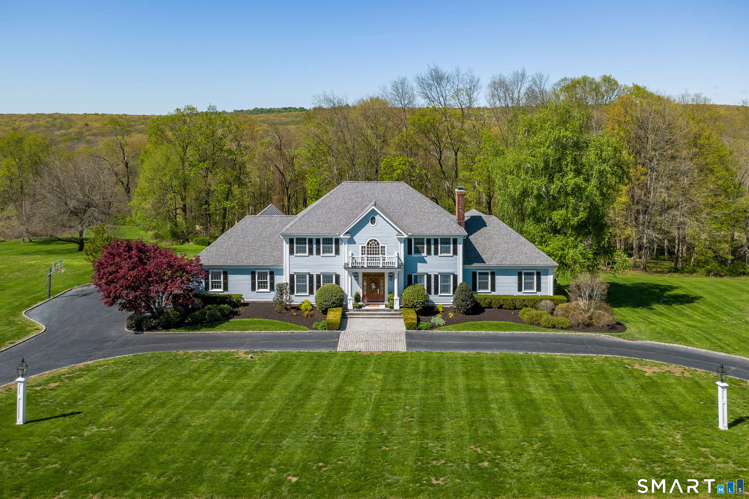 16 Farm Meadow Road Newtown, CT 06470 - Photo 1 of 40 a view of a house with a big yard
