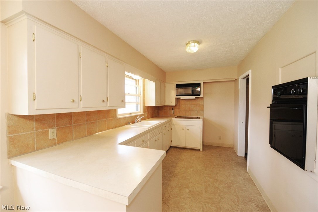 5660 Dailey Road New Franklin, OH 44319 - Photo 8 of 23 Wide Kitchen W/Plenty of Cabinet/Countertop Space!