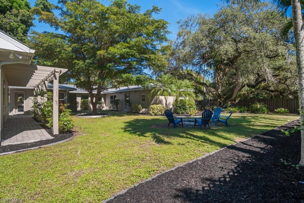 2300 North Road Naples, FL 34104 - Photo 20 of 20 a view of a house with swimming pool