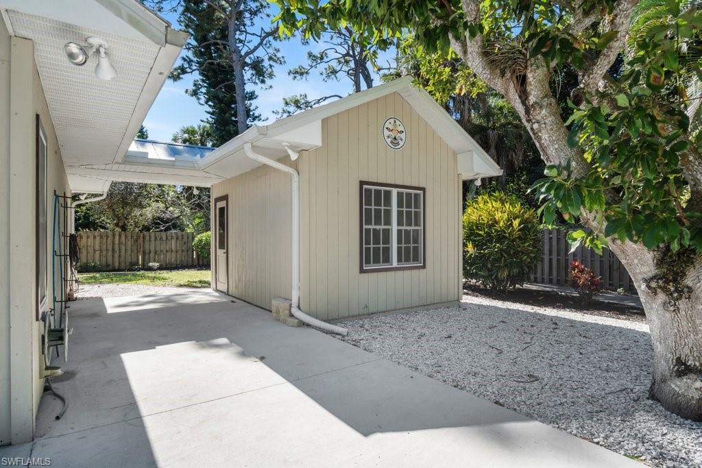2300 North Road Naples, FL 34104 - Photo 6 of 20 a view of a house with a yard