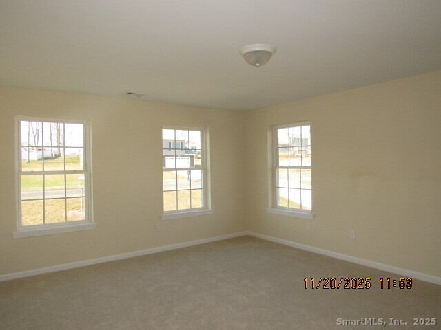 31 Warm Earth Road Naugatuck, CT 06770 - Photo 20 of 36 an empty room with windows