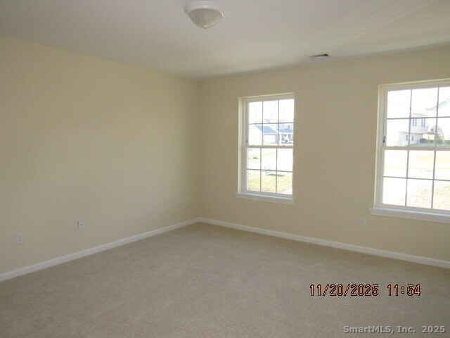 31 Warm Earth Road Naugatuck, CT 06770 - Photo 24 of 36 an empty room with a window