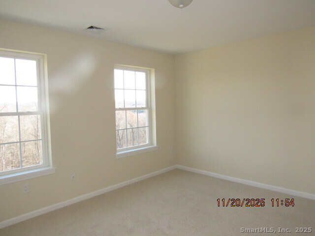 31 Warm Earth Road Naugatuck, CT 06770 - Photo 25 of 36 an empty room with a window