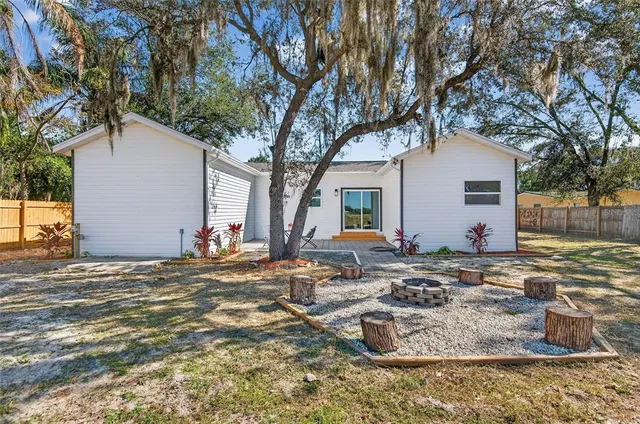 a view of a house with swimming pool
