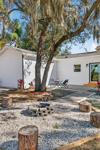 a backyard of a house with seating space