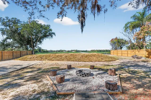 a view of a terrace with furniture and outdoor space