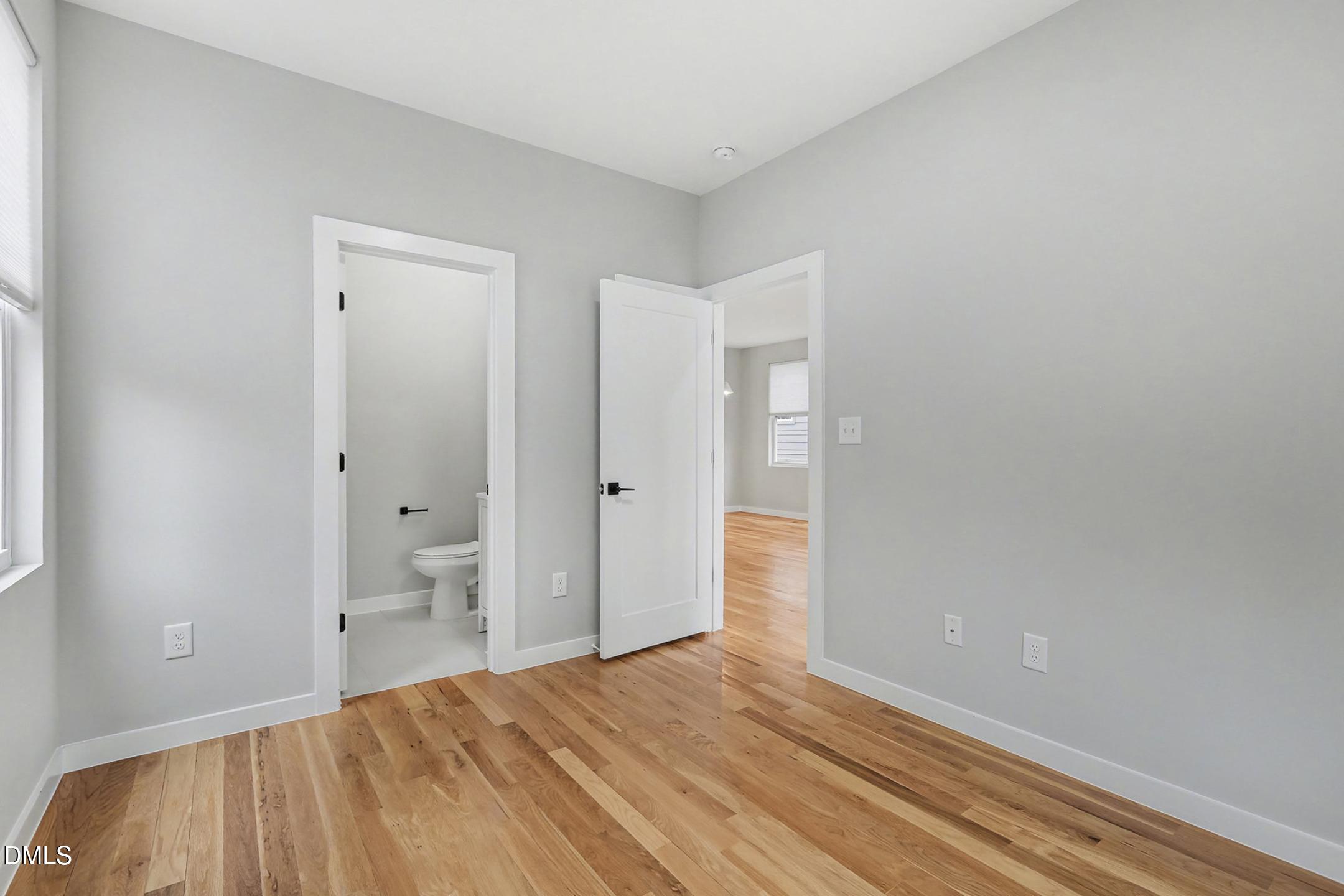 1508 East Jones Street Raleigh, NC 27610 - Photo 19 of 38 1st floor bedroom (#1) with Full Bathroom (Guest Suite)