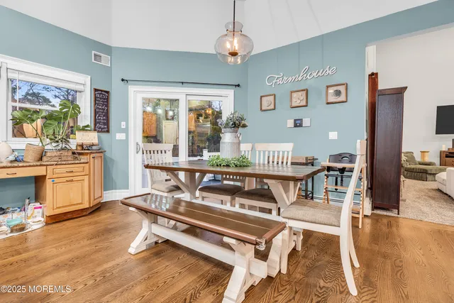 a view of staircase with stainless steel appliances