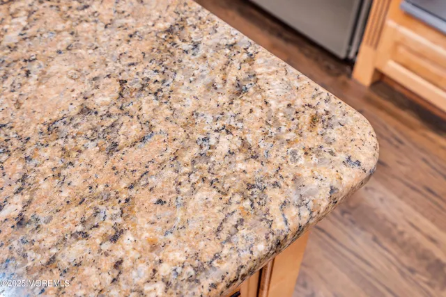 a view of staircase with stainless steel appliances