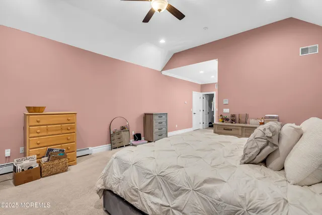 a view of a workspace with furniture and gym equipment