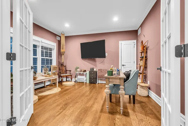 a bedroom with a bed and a chair