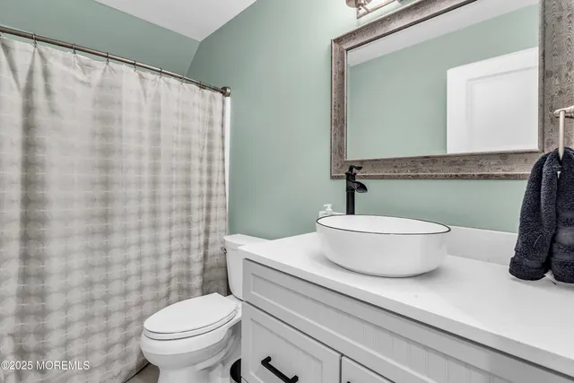 a view of backyard with sitting area