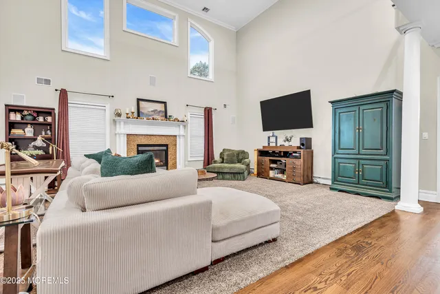 a bedroom with a bed and a fireplace