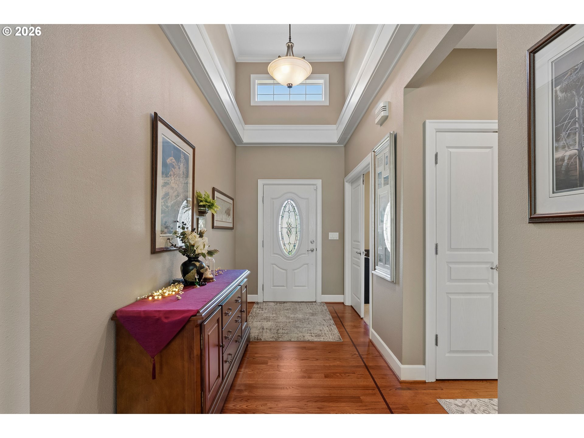 945 Northwest Angel Heights Road Stevenson, WA 98648 - Photo 4 of 41 a hallway with a mirror and furniture