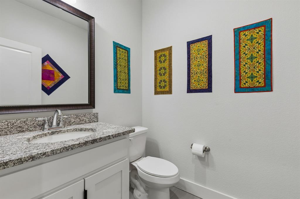 6527 Bowman Roberts Road Fort Worth, TX 76179 - Photo 14 of 27 Convenient First-Floor Powder Room With Granite Finishes