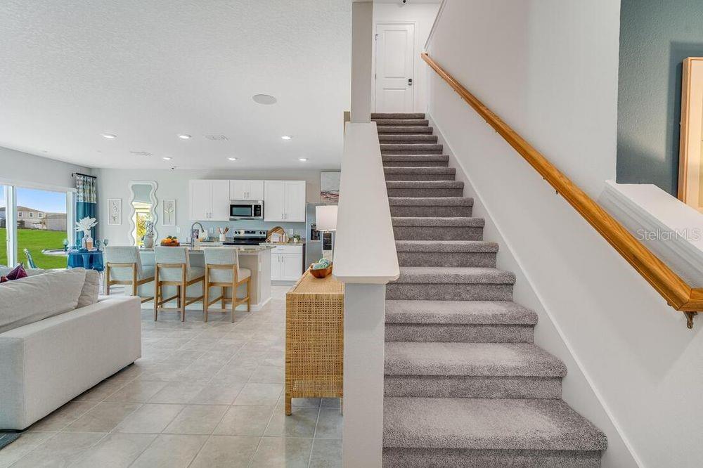 13812 Shellmore Avenue Palmetto, FL 34221 - Photo 16 of 30 a living room with furniture and a view of entryway