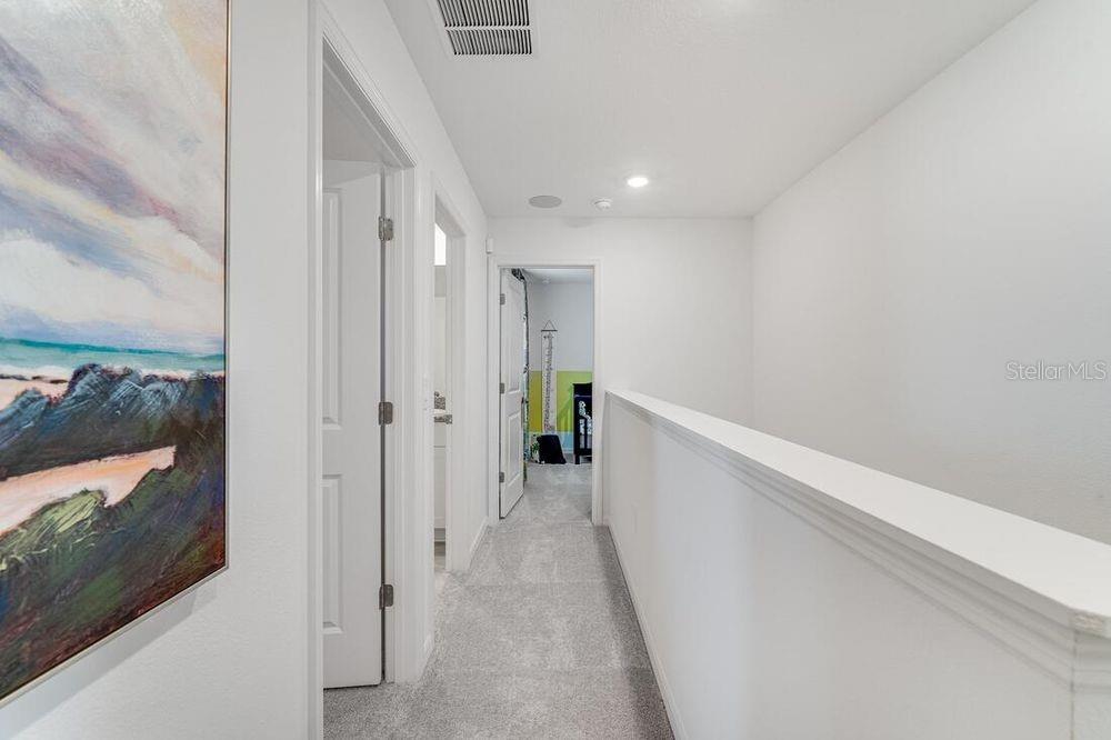 13812 Shellmore Avenue Palmetto, FL 34221 - Photo 17 of 30 a view of a hallway with a hallway
