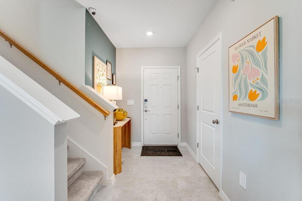 13812 Shellmore Avenue Palmetto, FL 34221 - Photo 18 of 30 a view of entryway with furniture and stairs