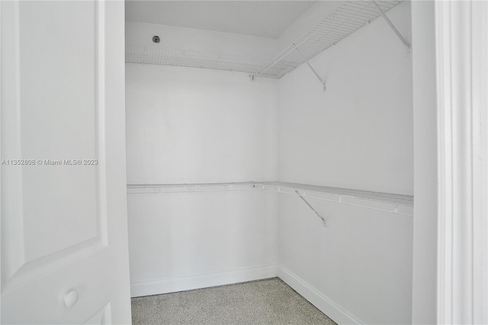 2665 Southwest 37th Avenue, Unit 914 Miami, FL 33133 - Photo 13 of 30 a view of small space with racks on the wall