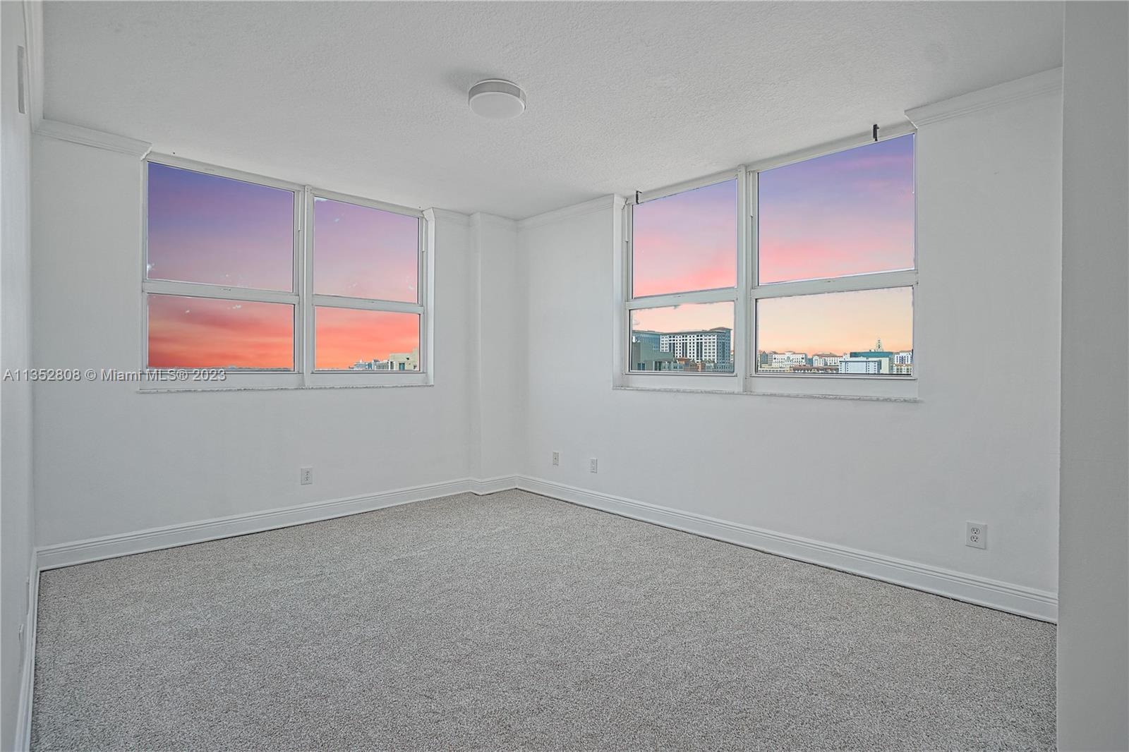 2665 Southwest 37th Avenue, Unit 914 Miami, FL 33133 - Photo 14 of 30 an empty room with a window