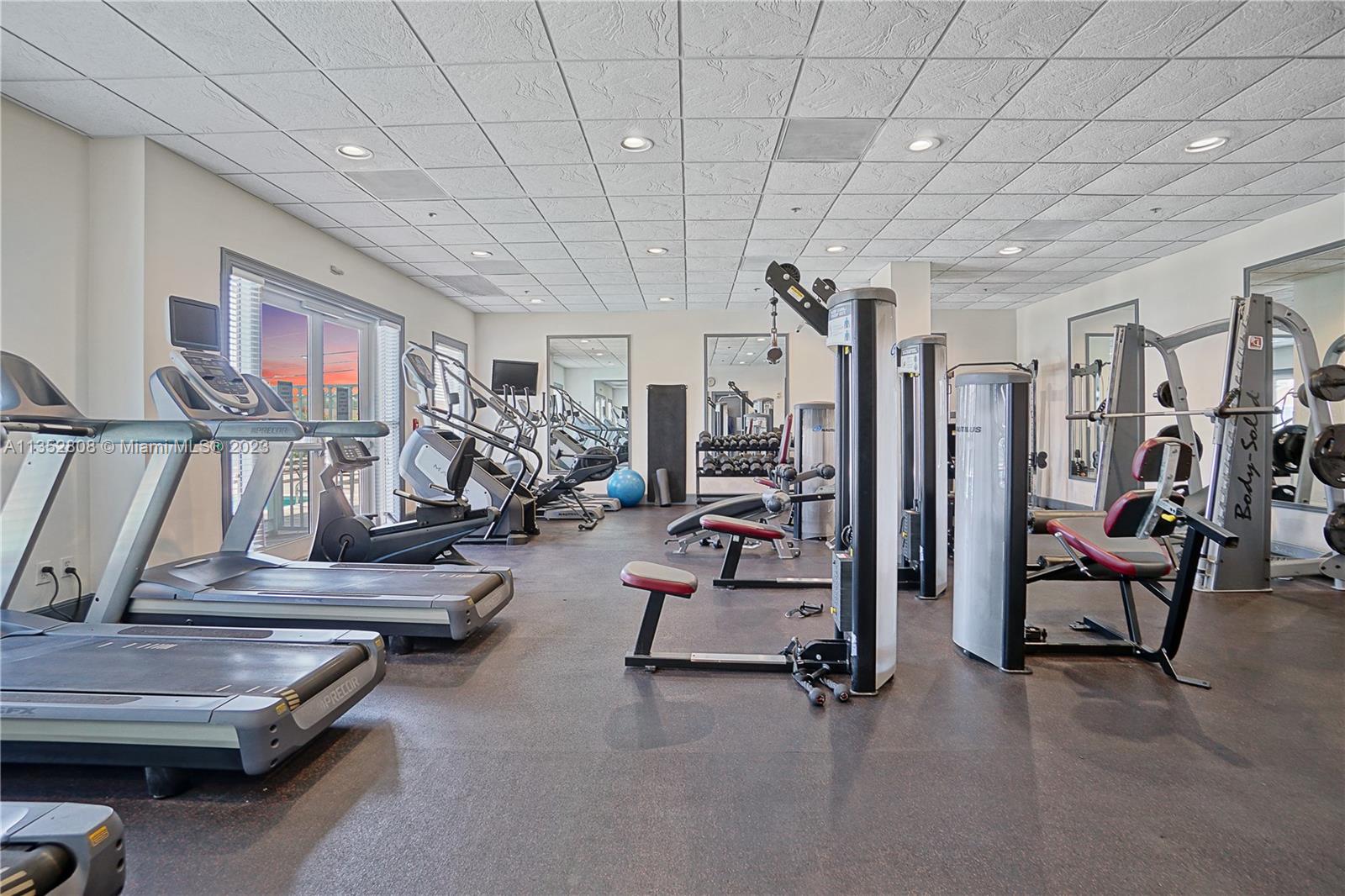2665 Southwest 37th Avenue, Unit 914 Miami, FL 33133 - Photo 25 of 30 a view of a room with gym equipment
