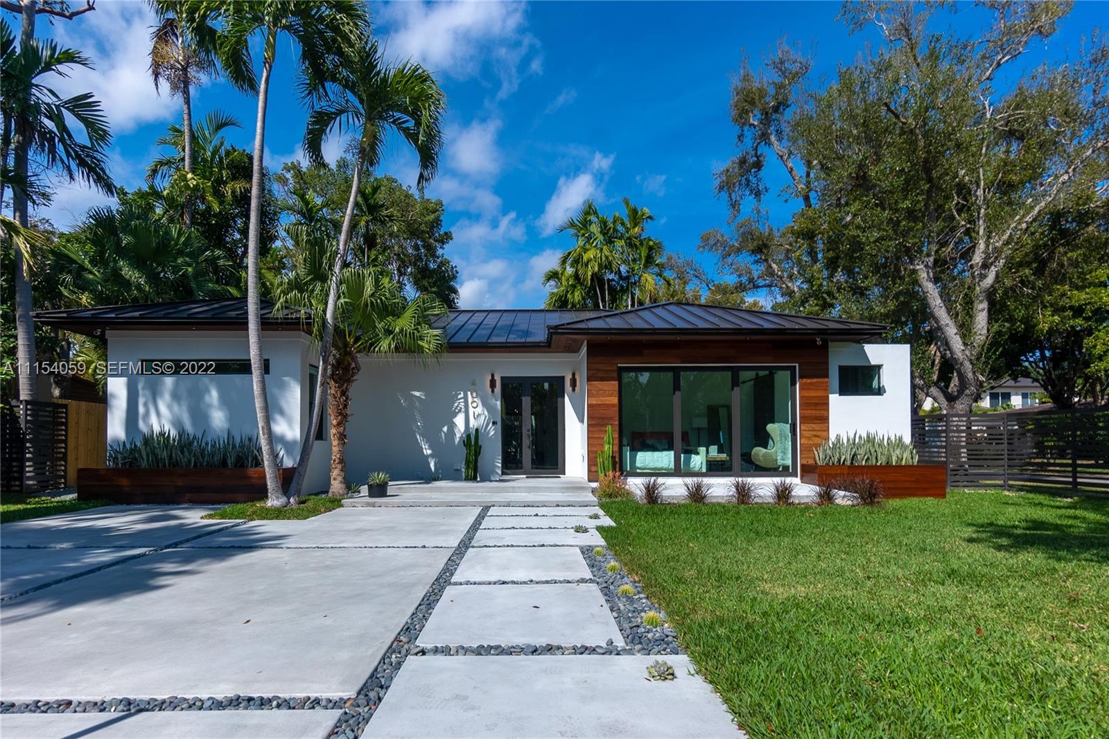 4001 Woodridge Road Miami, FL 33133 - Photo 1 of 15 Exterior Front