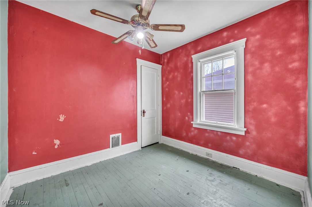1011 Spring Road Cleveland, OH 44109 - Photo 27 of 47 Spare room featuring ceiling fan and light wood-type flooring