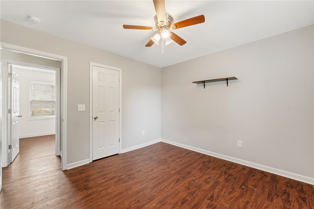 104 Leah Drive Pendleton, SC 29670 - Photo 17 of 23 This spacious bedroom offers ample natural light and durable flooring for comfortable living.
