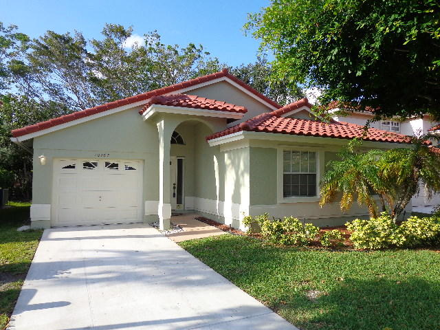 10767 Lake Oak Way Boca Raton, FL 33498 - Photo 1 of 18 Front view