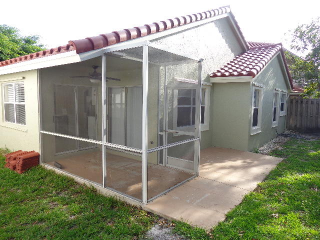 10767 Lake Oak Way Boca Raton, FL 33498 - Photo 17 of 18 Screened patio