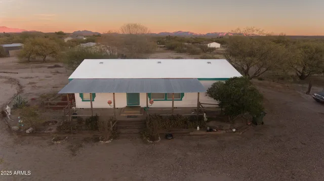 a view of a house with a mountain