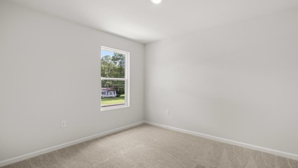 10 Coggins Place Northeast Rome, GA 30165 - Photo 31 of 52 an empty room with windows