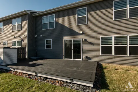 a view of a house with basketball court