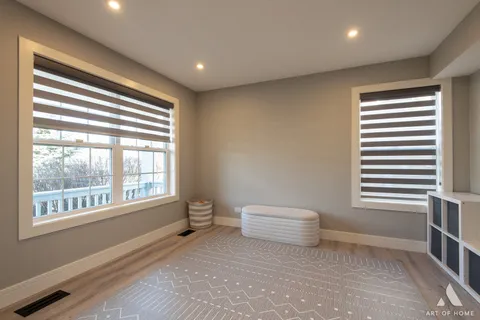 a view of a room with a window and a bathroom