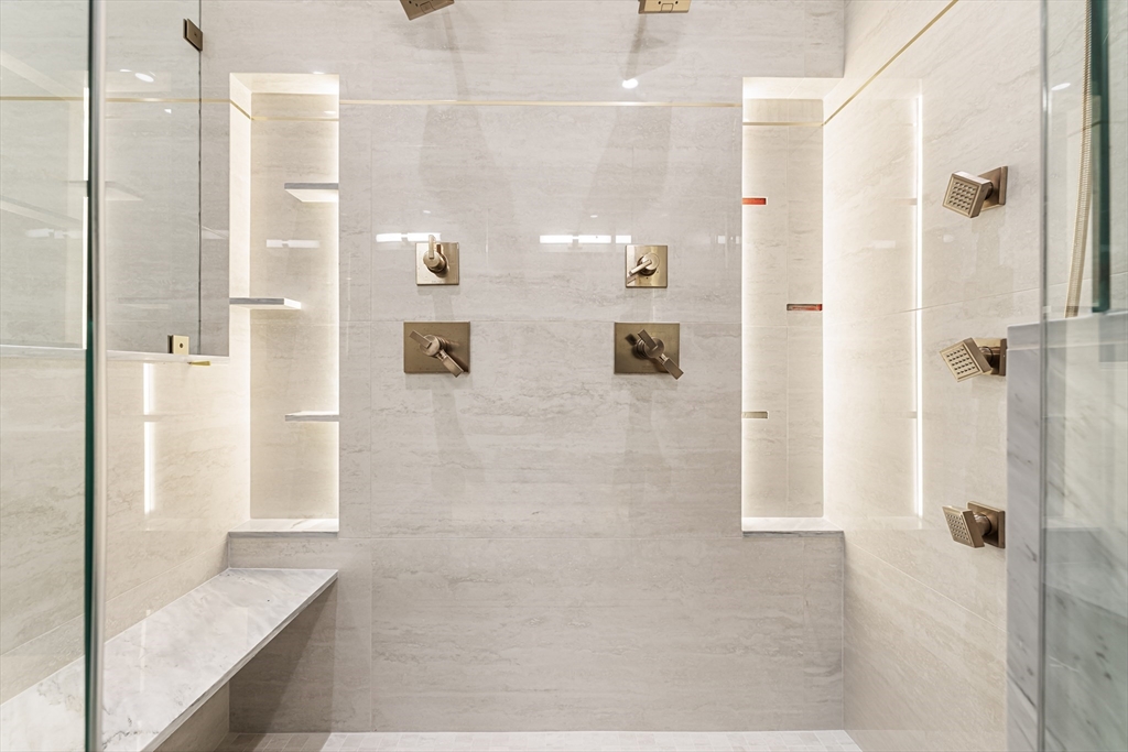 267 Tappan Street, Unit 1 Brookline, MA 02445 - Photo 16 of 23 a bathroom with a shower and a tub