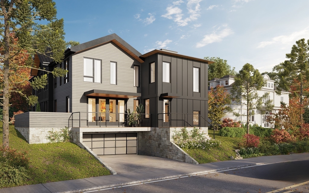 267 Tappan Street, Unit 1 Brookline, MA 02445 - Photo 23 of 23 a front view of a house with a garden and plants