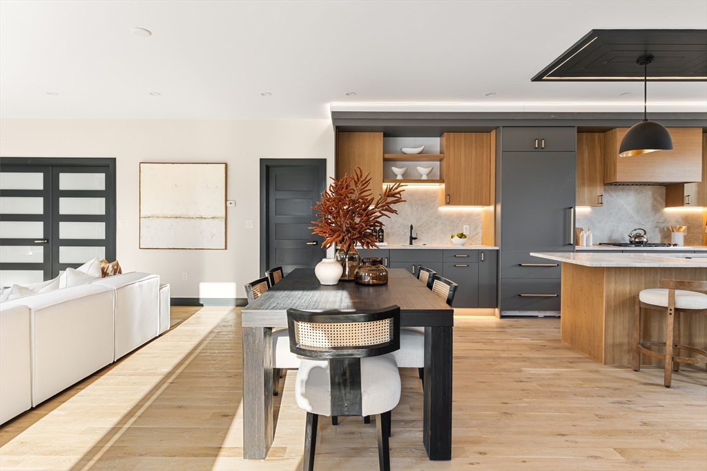 267 Tappan Street, Unit 1 Brookline, MA 02445 - Photo 8 of 23 a view of a dining room with furniture and window