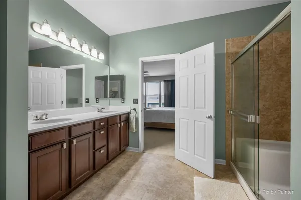 a bathroom with a shower and toilet