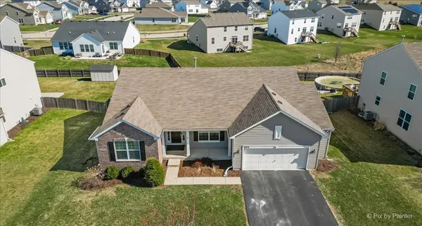 aerial view of a house with a garden