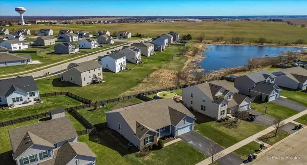 an aerial view of a house with a garden