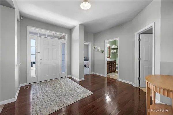 a view of livingroom and hardwood floor