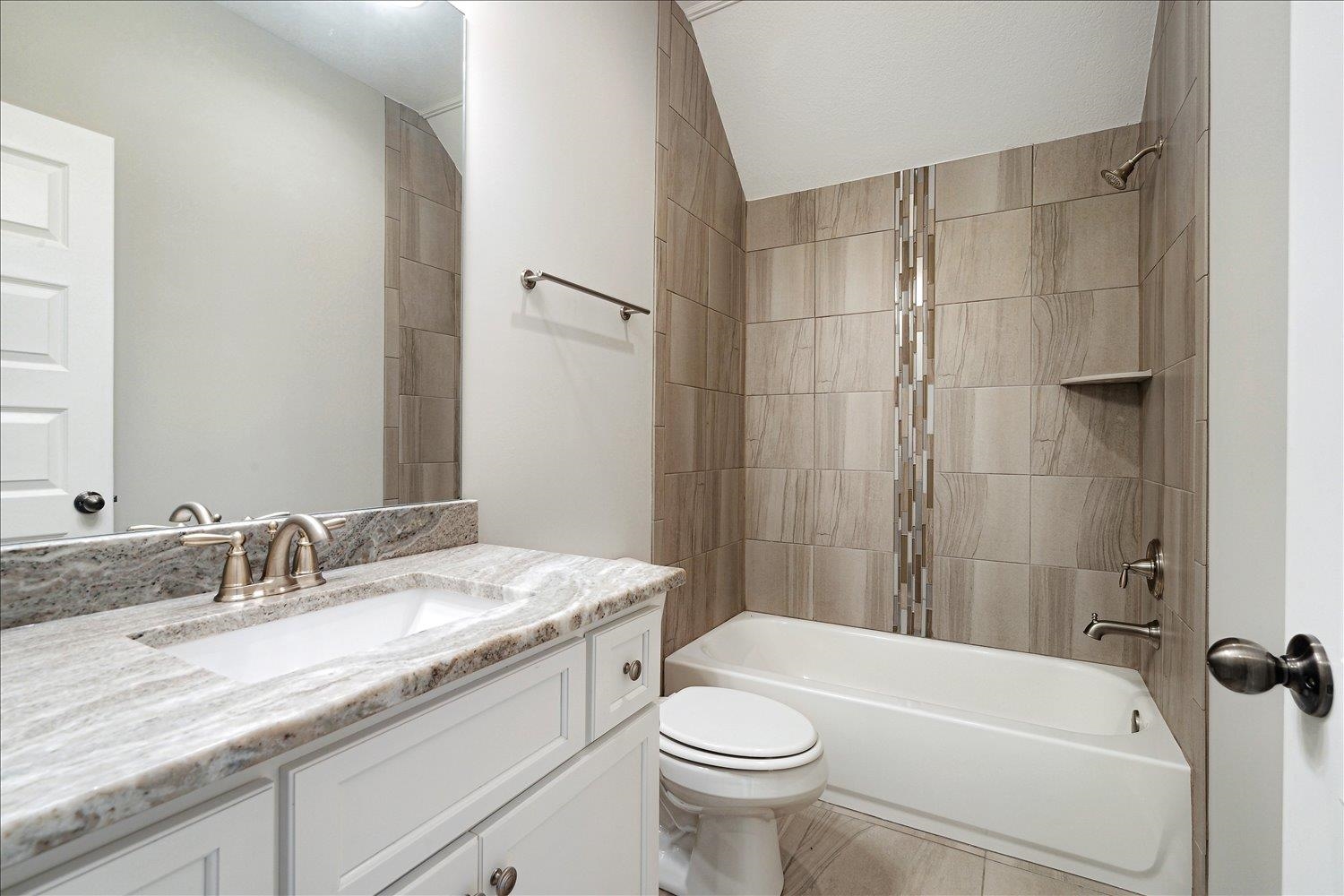 680 Magnolia Lane Piperton, TN 38017 - Photo 28 of 40 Bathroom with toilet, tub / shower combination, and vanity