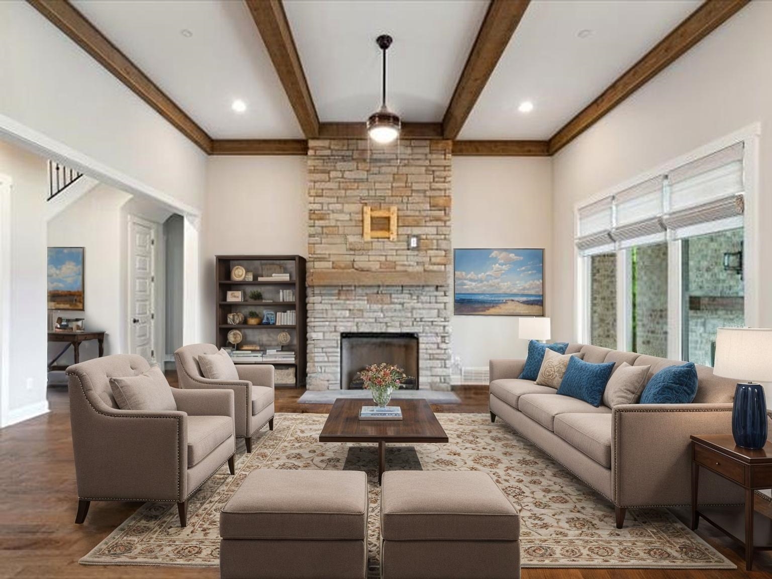 680 Magnolia Lane Piperton, TN 38017 - Photo 3 of 40 Staged Living area featuring wood finished floors, beam ceiling, and a stone fireplace