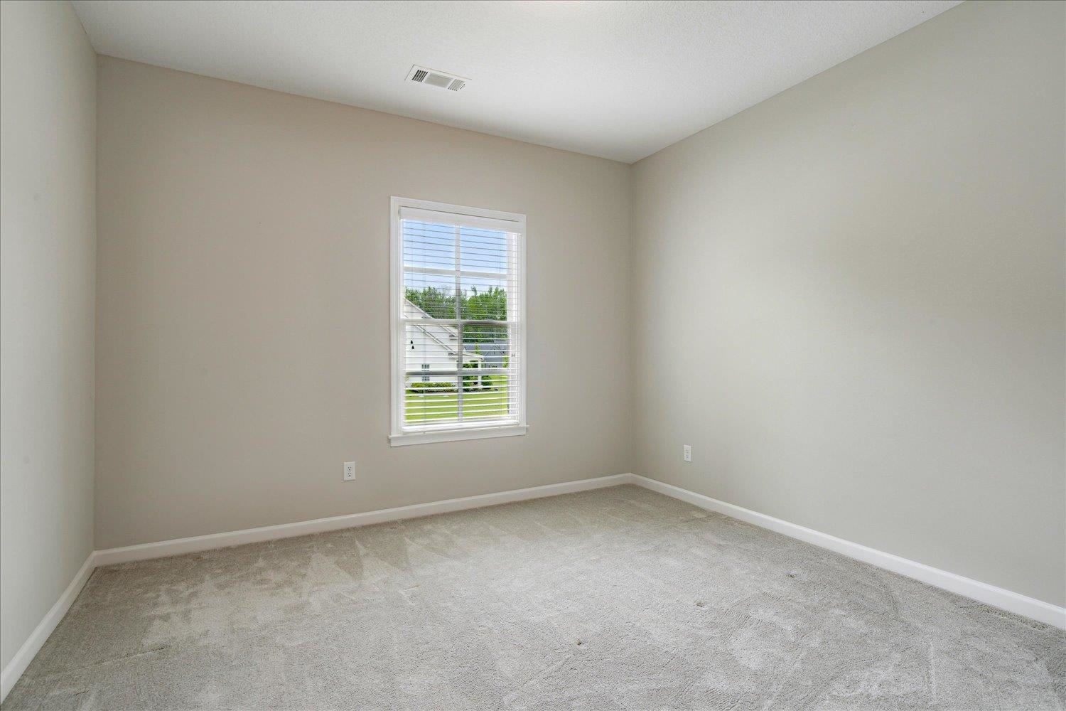 680 Magnolia Lane Piperton, TN 38017 - Photo 31 of 40 Bedroom Up with light colored carpet and baseboards