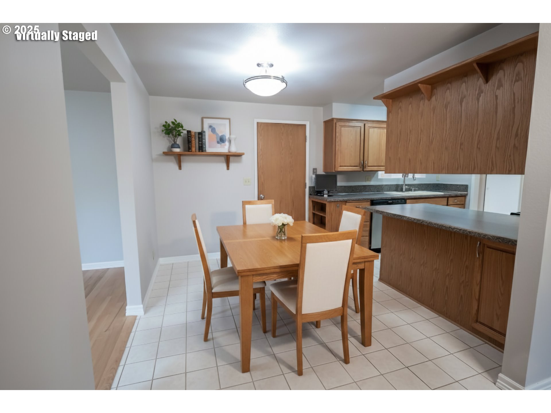 2556 Dumas Drive Springfield, OR 97477 - Photo 19 of 48 a dining room with a wooden table and chairs