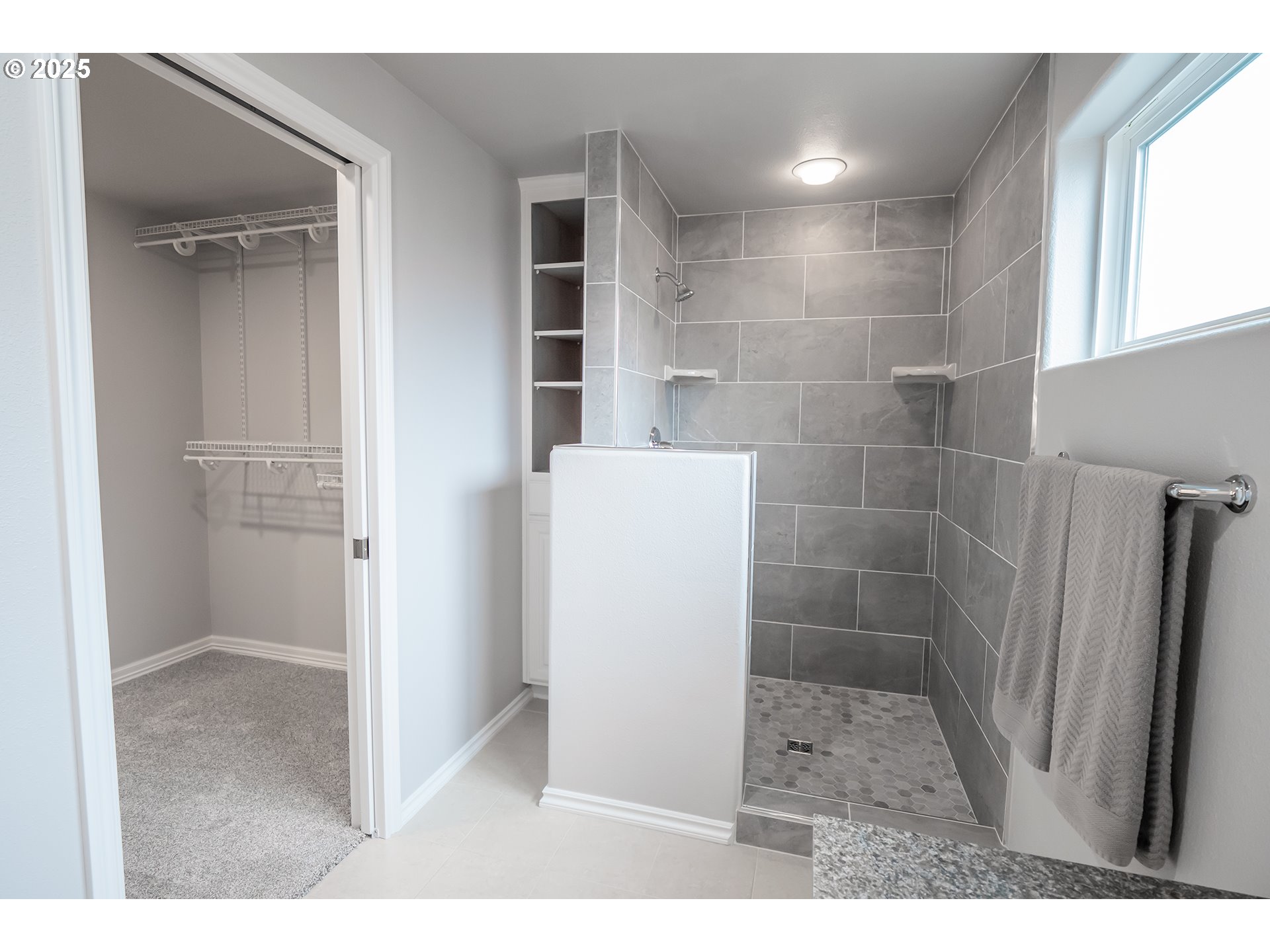 2556 Dumas Drive Springfield, OR 97477 - Photo 30 of 48 a bathroom with a shower and a sink